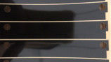 O ANIMAL DE ESTIMAÇÃO preto brilhante cortou a tira longa flexível do furo dois pequeno de Mylar finamente